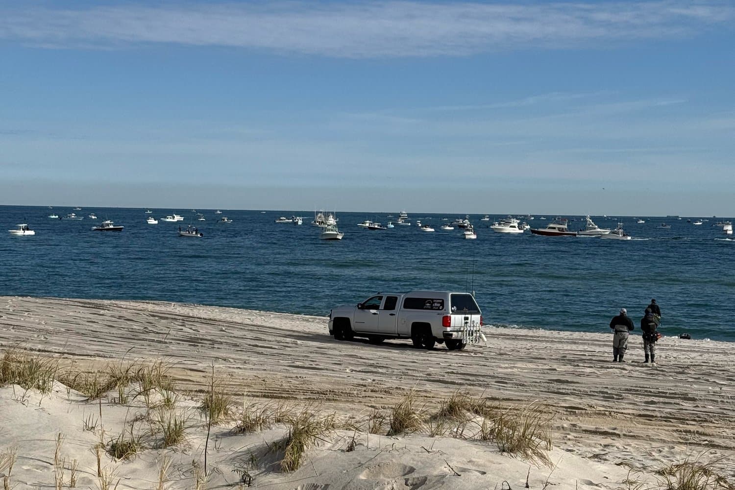 Surf anglers and a pickup on the beach